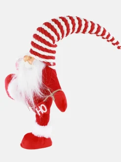 Weinachtsgnom auf einem Bein